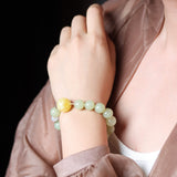 Amber and Hetian Jade Bracelet with 18K Gold Connectors - Bracelet - Feather Peace