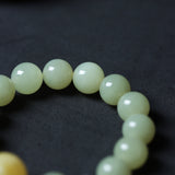 Amber and Hetian Jade Bracelet with 18K Gold Connectors - Bracelet - Feather Peace