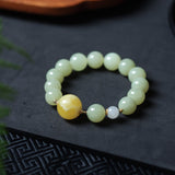 Amber and Hetian Jade Bracelet with 18K Gold Connectors - Bracelet - Feather Peace